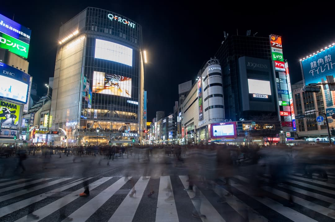 Watch the city move at Shibuya Crossing