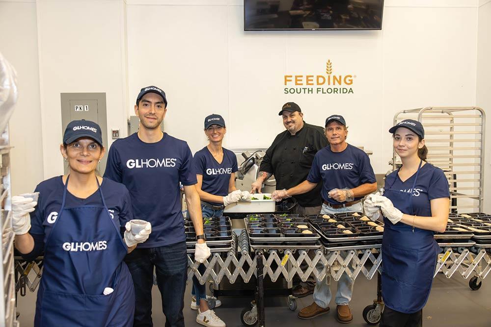 GL Homes employees volunteering at Feeding South Florida.