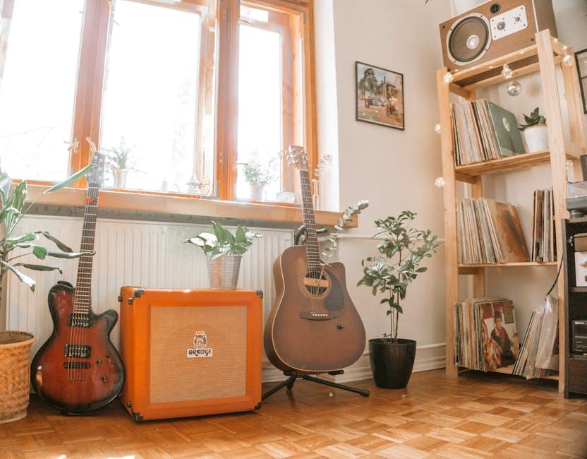 A home recording studio with guitar and amp in evening light