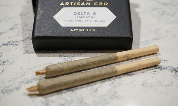 Title: a couple of sticks sitting on top of a counter