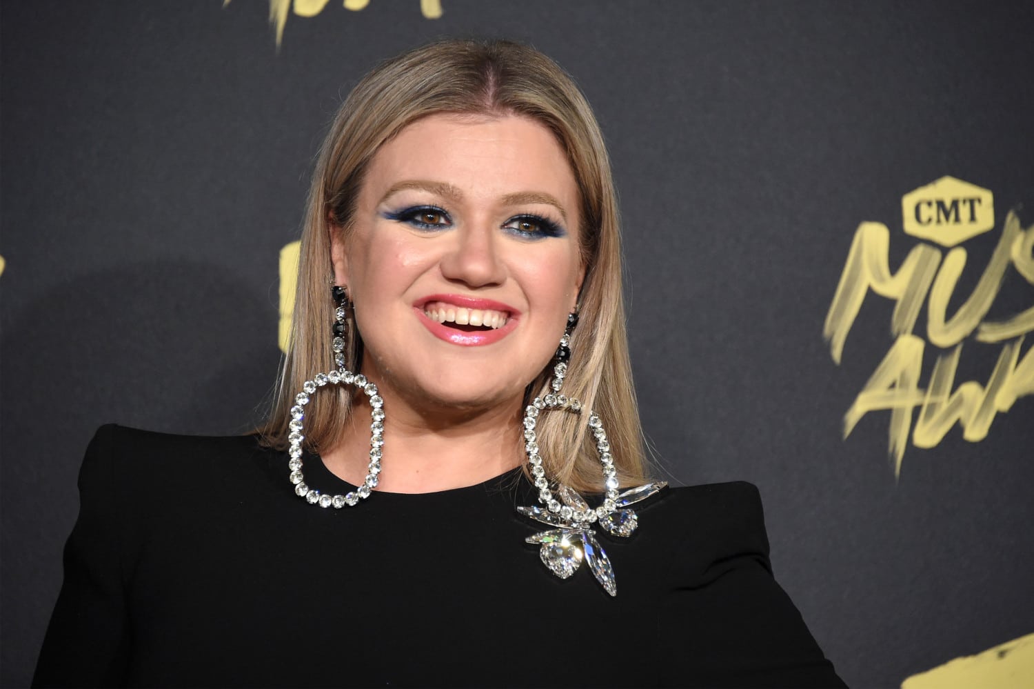 2018 CMT Music Awards - Arrivals by Mike Coppola / Getty Images Entertainment kelly clarkson photo
