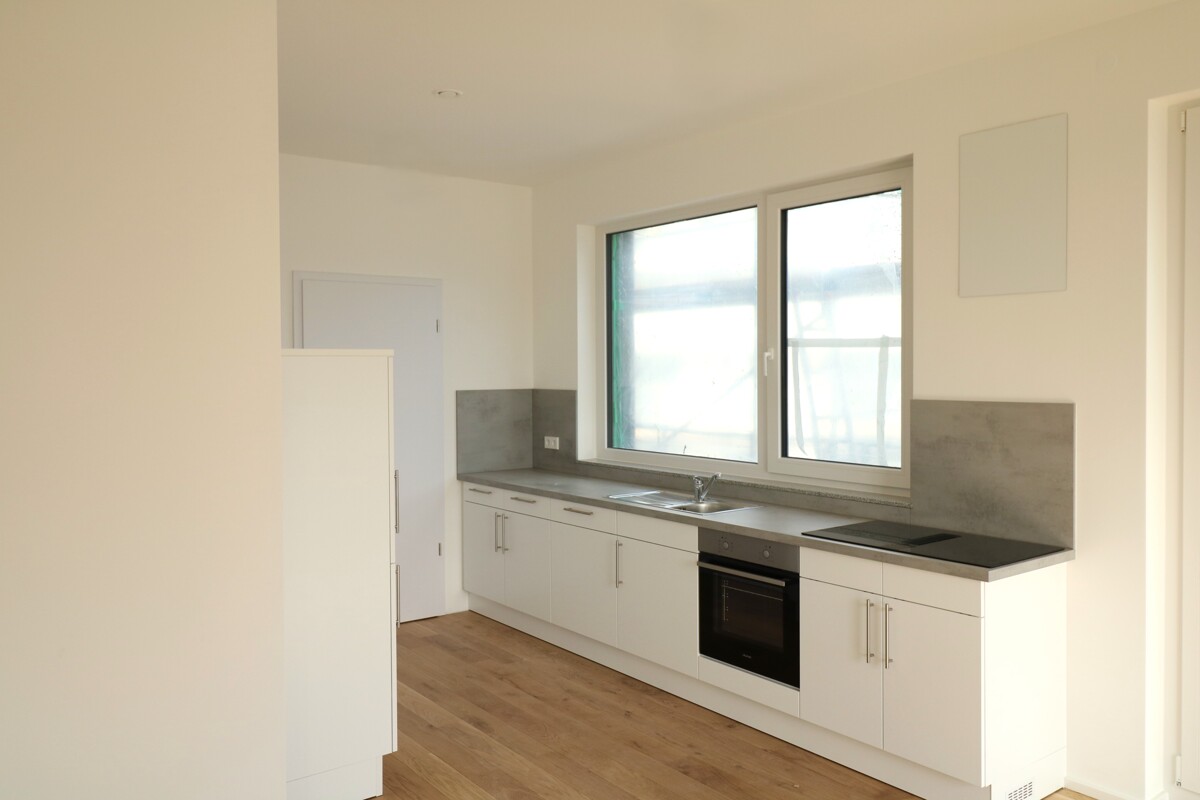 *ERSTBEZUG* Lichtdurchflutete 2-Zimmer Wohnung mit Balkon direkt am Kocher! - Photo 2