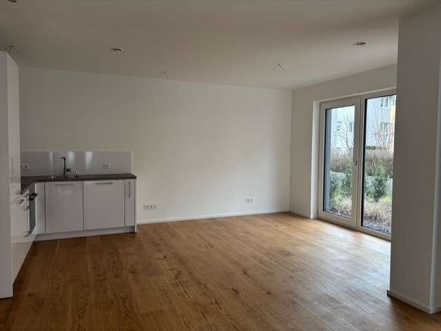 Traumhafte 2-Zimmer Wohnung mit großer Terrasse und Gartenanteil wartet auf Sie! - Foto 4