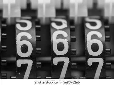 Counter numbers closeup, religious symbol.