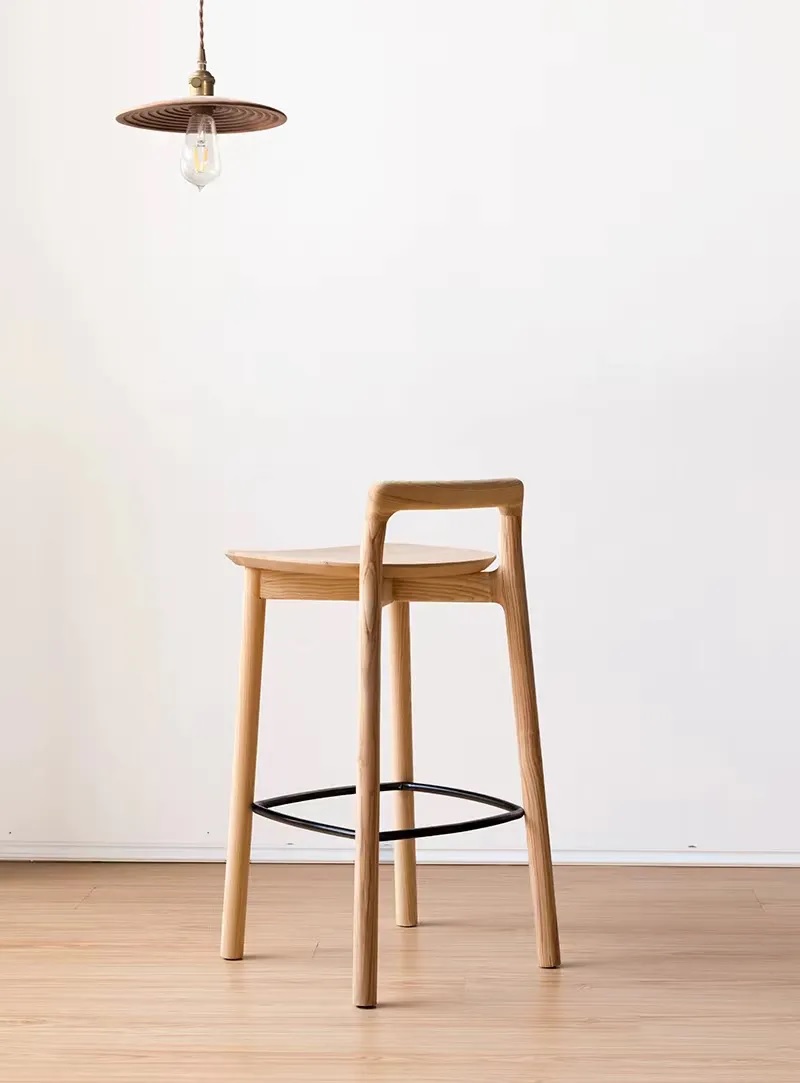 Brown high bar stool with metal footrest