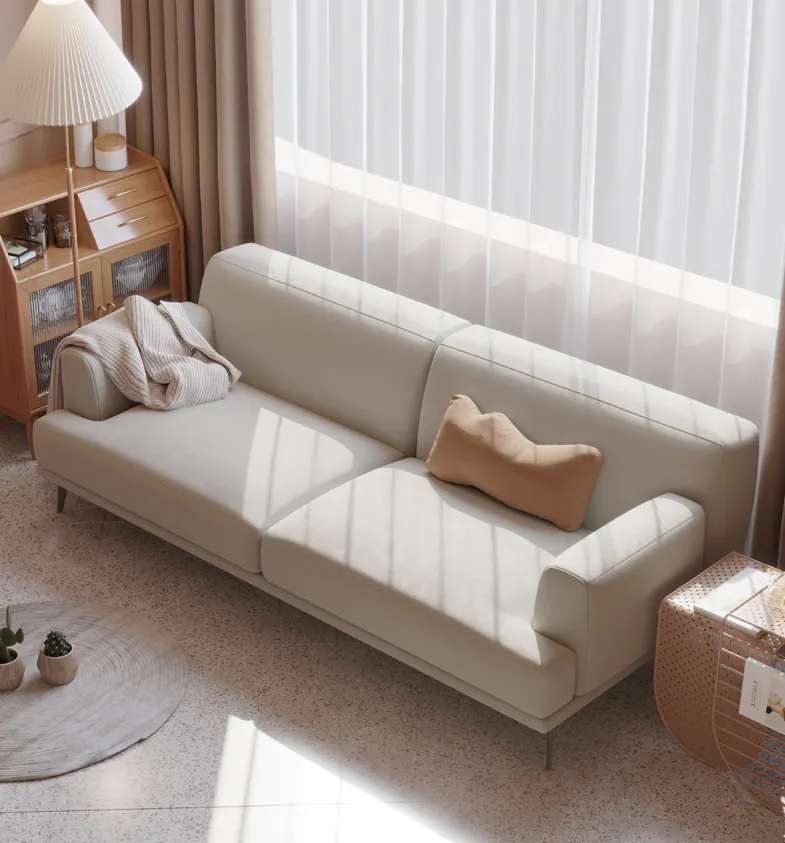 Cream fabric 3-seater sofa with a solid wood frame and carbon steel legs.