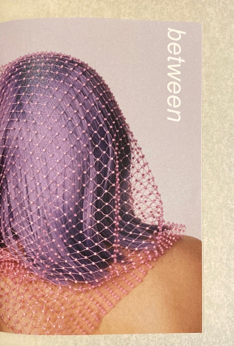 Between Zine magazine cover