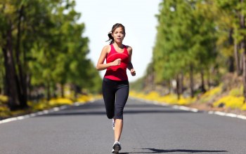 Woman running,street,shade,trees