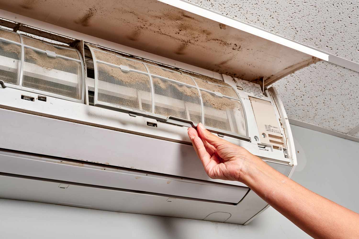 Fix a Dirty Air Filter of a Wall-Mounted Air Conditioner