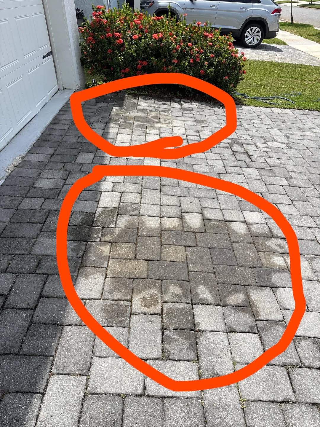 Removing Oil and Transmission Fluid Stains from a Driveway on a Budget

Description of Issue