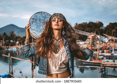 beautiful young fashion model woman posing outdoors at fisherman pier background