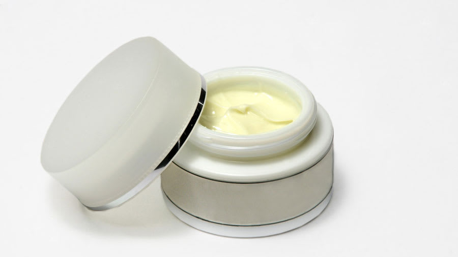​Skin cream in white jar