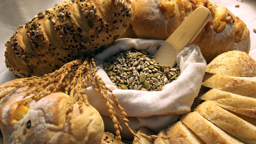 Multiple grains and breads spread out