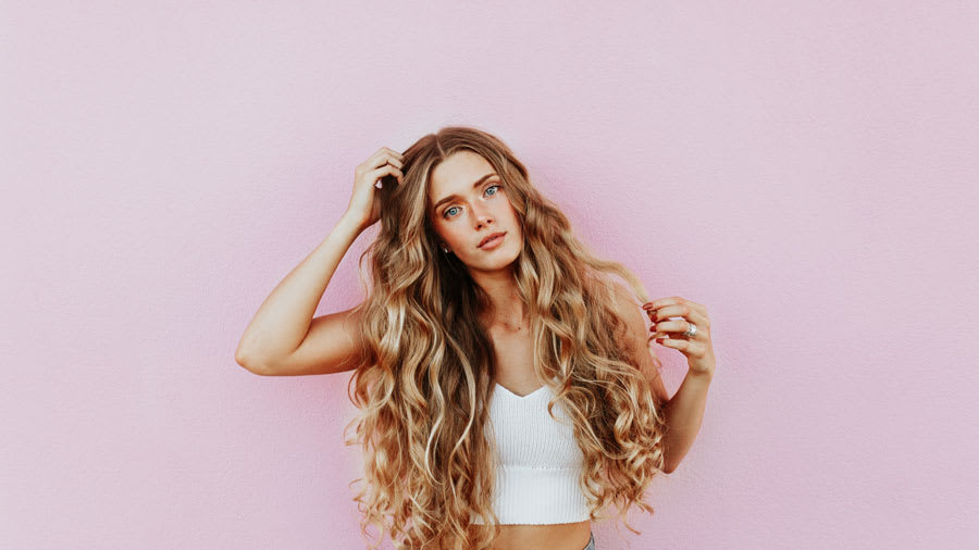 woman with healthy long and curly hair