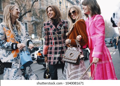 Milan, Italy - February 21, 2018: Models, bloggers and influencers with fashionable and stylish looking during Milan Fashion Week.