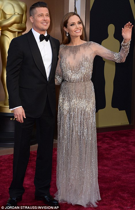 Magic twosome: Brad Pitt, a nominated producer for 12 Years A Slave arrived with Angelina