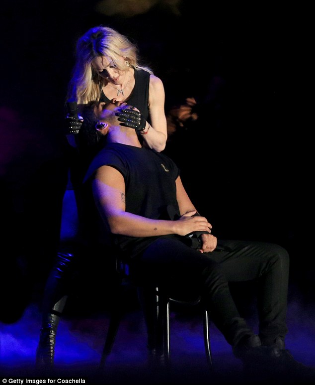 Dominant: She appeared to bat his hand away to make sure hers was on top on the stage