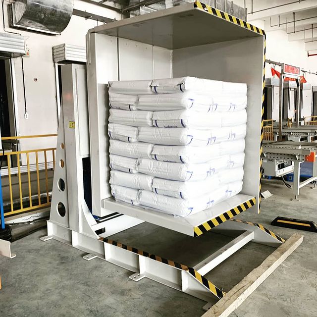 pallet inverter, warehouse efficiency, hydraulic system, material handling, industrial machinery, safety features
