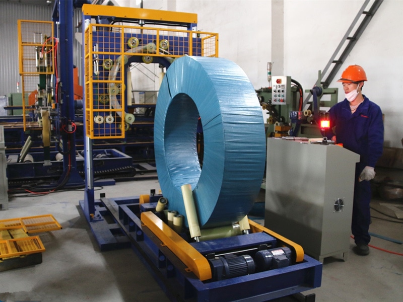coil packing machine, steel industry, automated packaging