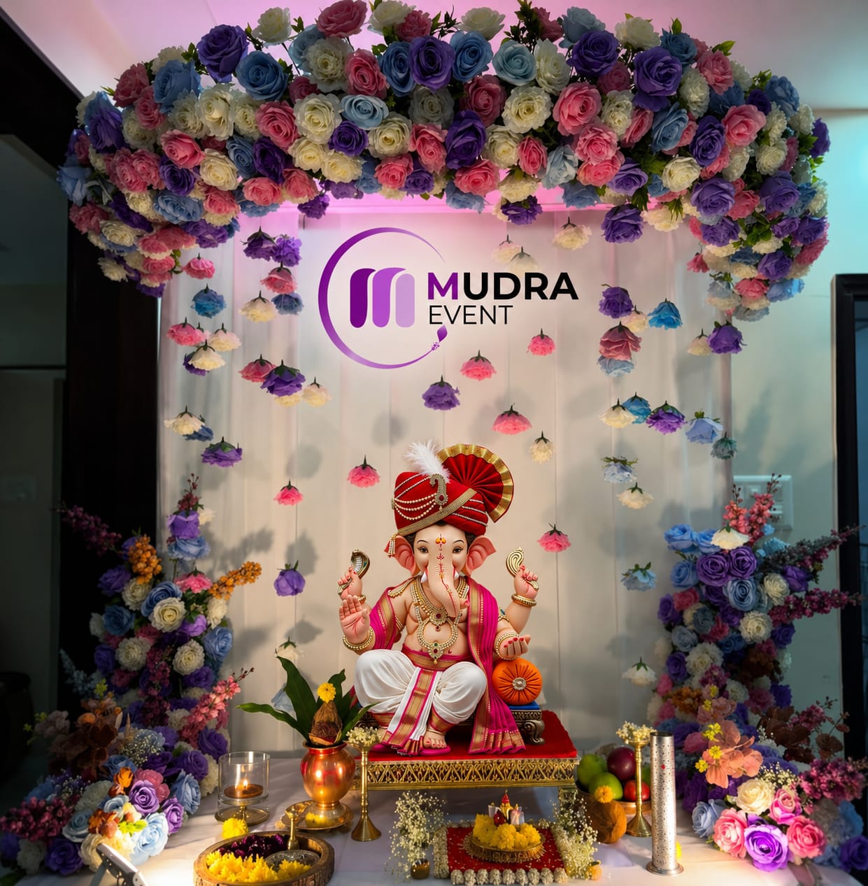 Pastel Floral Arch Ganpati Decoration with Hanging Flowers