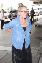 Christina Applegate - Departs on a flight at LAX airport 5/25/17