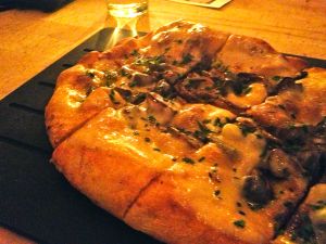 For what looked like a promising truffle cheese and wild mushroom pizza, I was not wild about it.