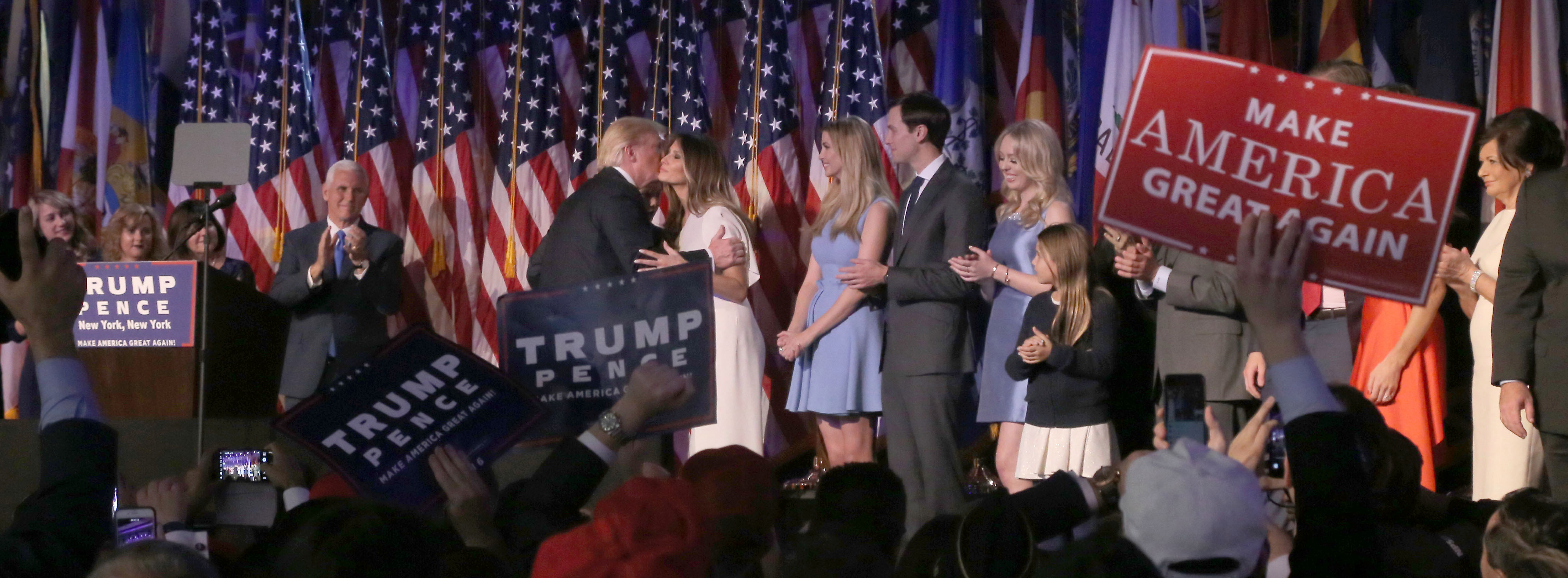 Donald Trump kisses his wife and future First Lady, Melania, but many feel Ivanka will be her father's real influence