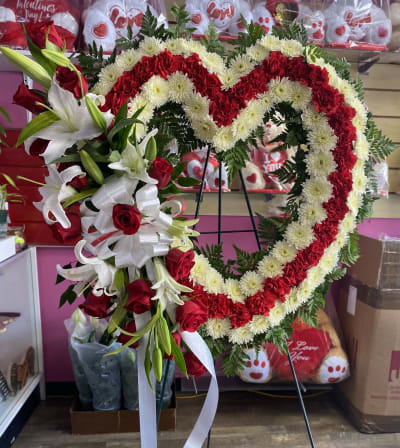 Red and white heart wreath arranged by a florist in Ocala, FL