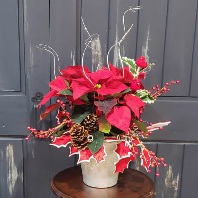 Poinsettia floral arrangements deals