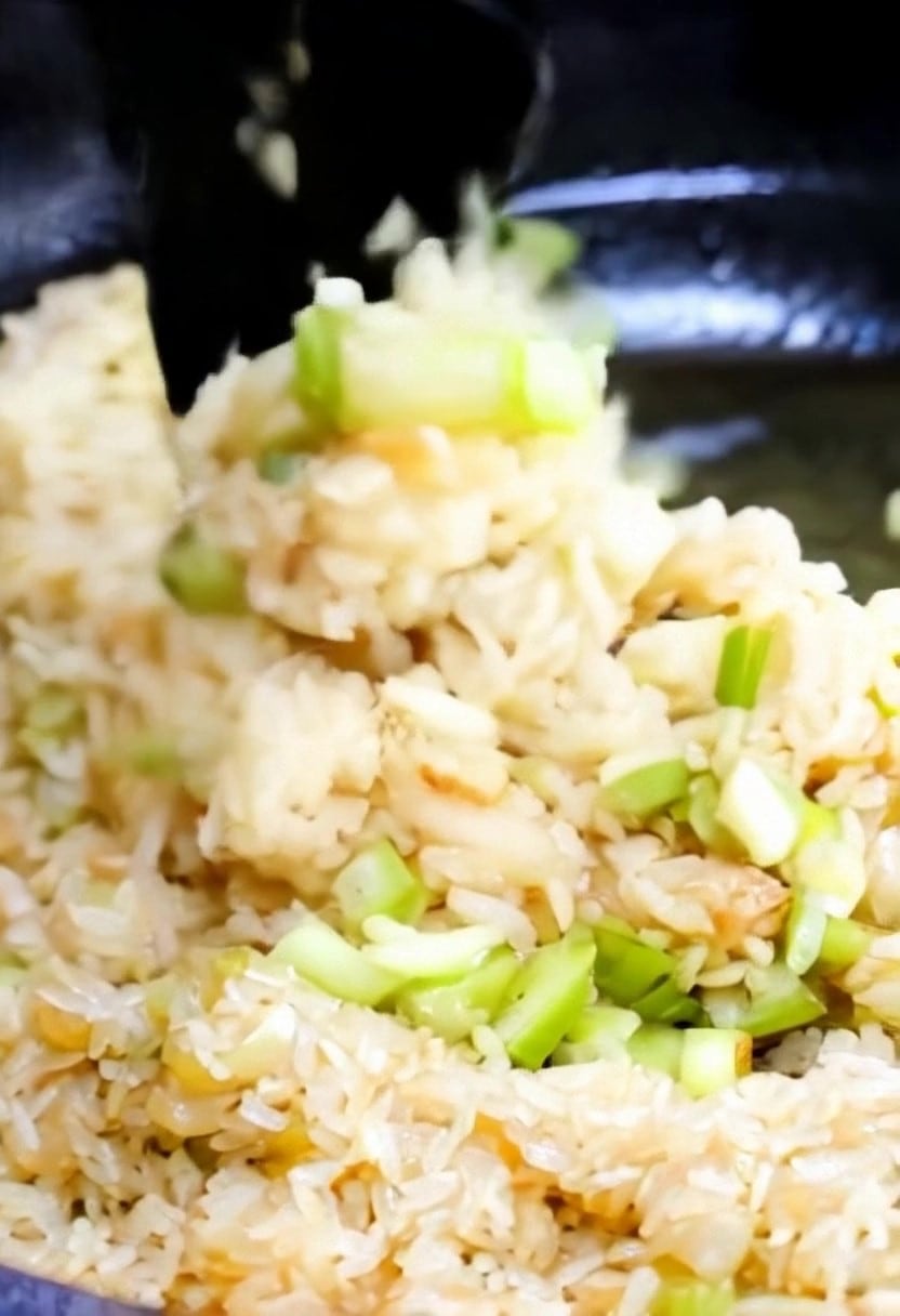 Add the rice in the pan coated with the butter.