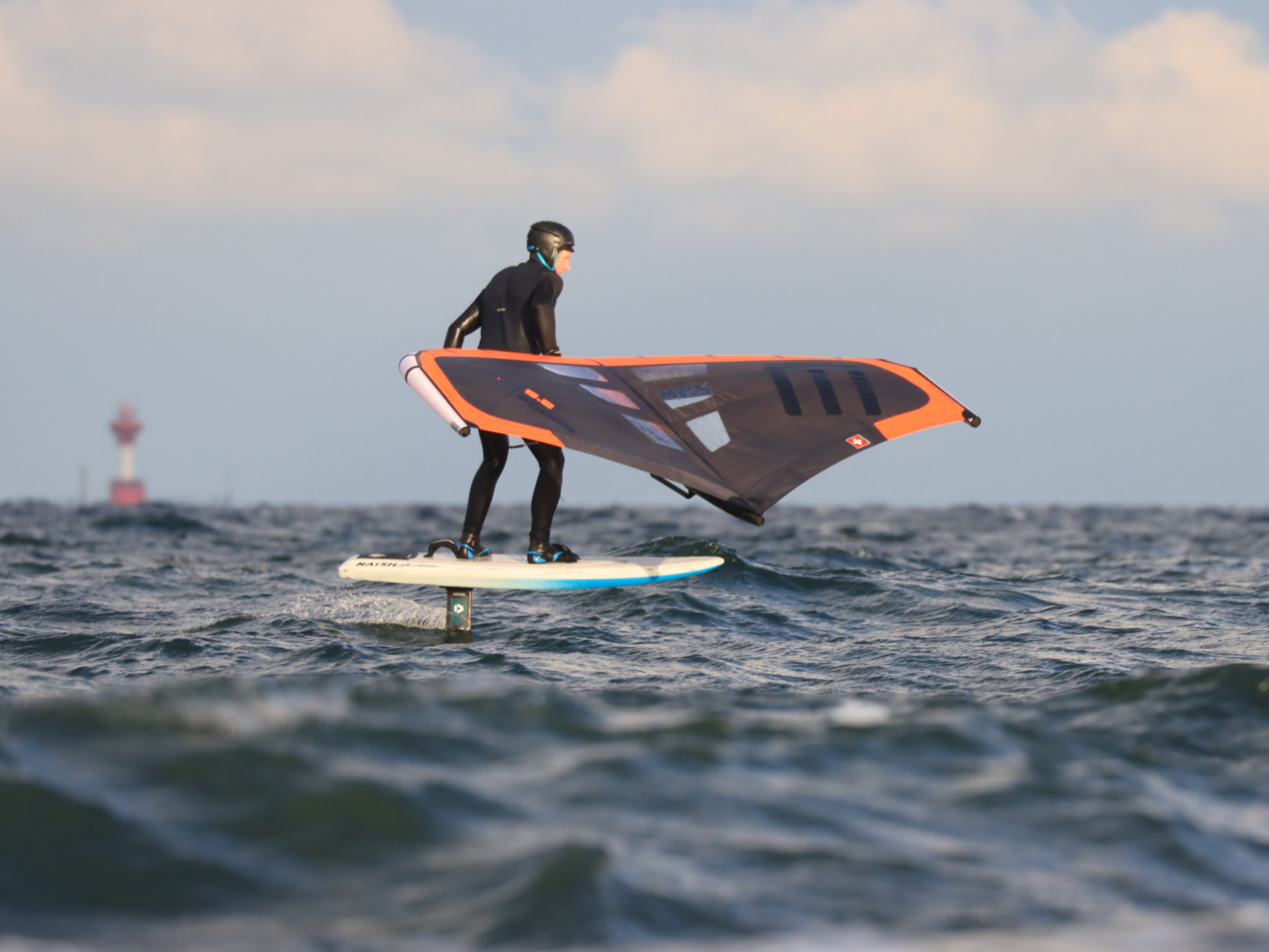 Mid-length wingboard: The Naish Hover Downwind Crossover in Mid-length wingboard: The Naish Hover Downwind Crossover in