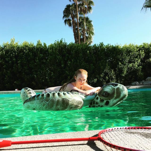 Molly C. Quinn in swimming pool