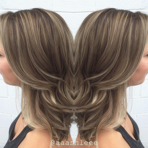 ash brown hair with thin highlights