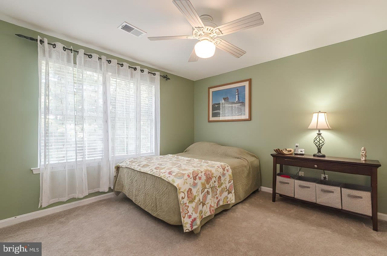 Welcome to this charming townhouse located at 5688 White Dove Ln! This inviting 2-bedroom, 3-bathroom home features a serene atmosphere with soft green walls and plenty of natural light, perfect for relaxing or entertaining. Enjoy the cozy ambiance of the spacious rooms and the convenience of modern living in a picturesque community.