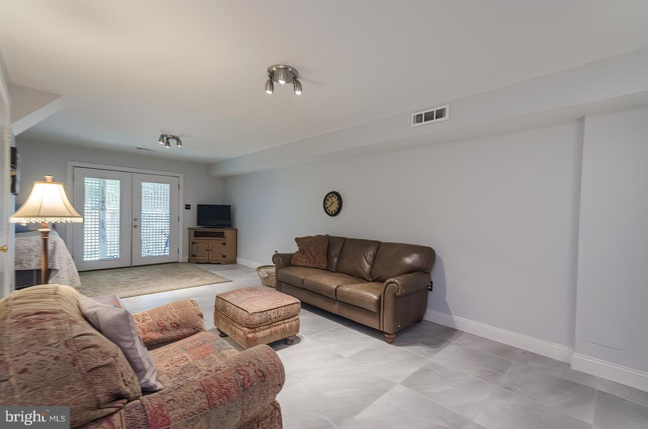 Discover your dream home at 5688 White Dove Ln, a charming end-of-row townhouse in Clifton, VA. This beautifully designed 2-bedroom, 3-bathroom residence features a bright and inviting living space, perfect for relaxation and entertaining.