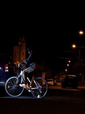 11pm, bike,outside,people, black,white,yellow