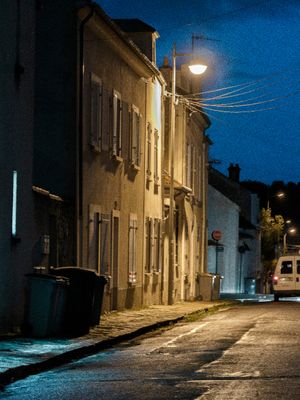 7pm, outside,architecture, yellow,blue,black,grey