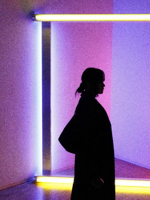 8pm, neon,inside,people, black,white,purple,yellow