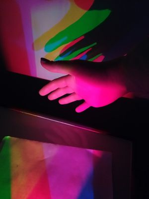 7pm, people,inside, pink,black,green,yellow,purple