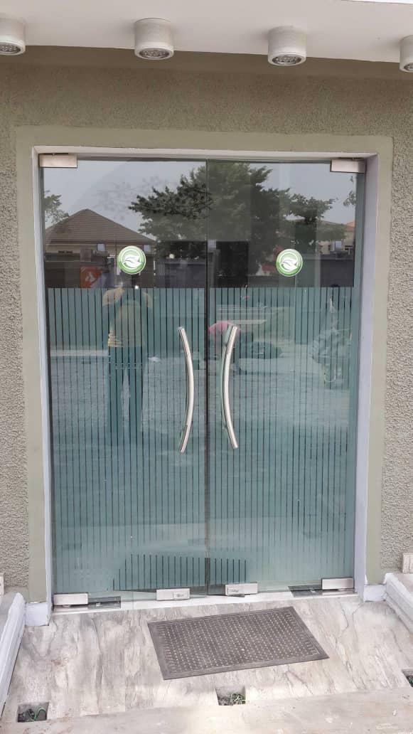 Frameless Glass Swing Door with Frosted Privacy Film