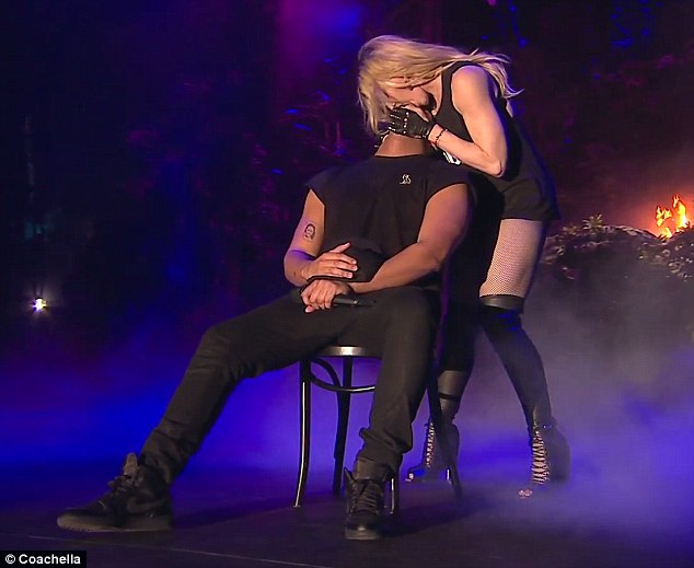 It was not a little peck either: The 56-year-old singer spent at least three seconds making out with the 28-year-old hit maker