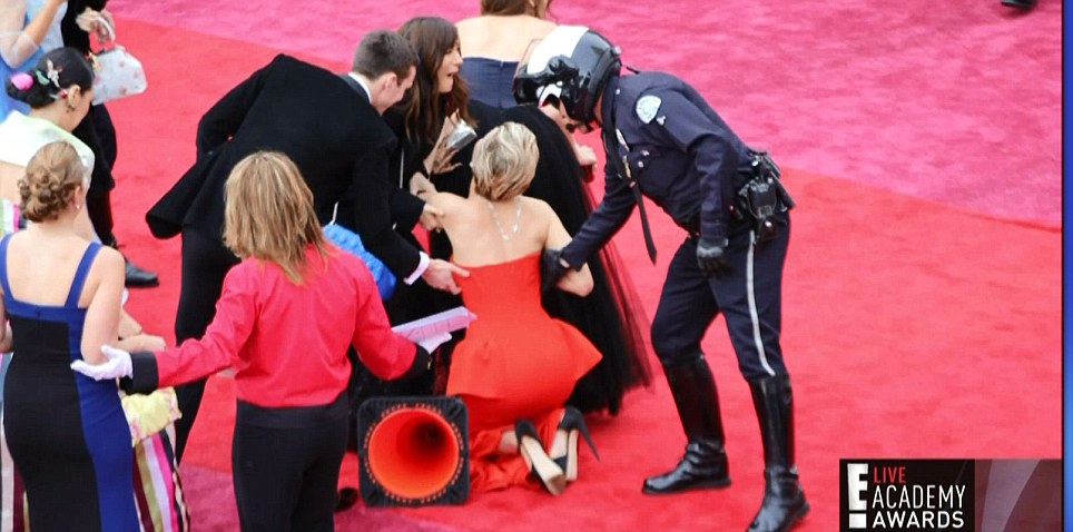 Awkward! The clumsy actress fell over on the red carpet
