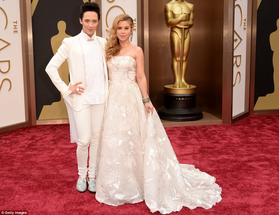 Golden duo: Johnny Weir (L) and Tara Lipinski are hosting for Access Hollywood following their amazing Olympic coverage