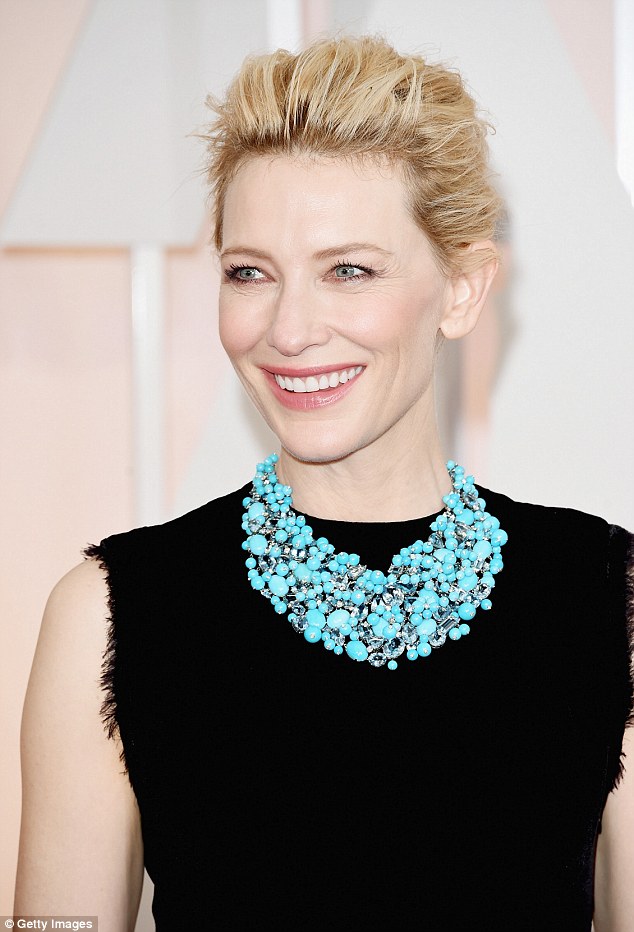 Statement necklace: Adding even more emphasis on the striking multi-beaded accessory the 45-year-old wore her blonde hair swept back into a high up-do