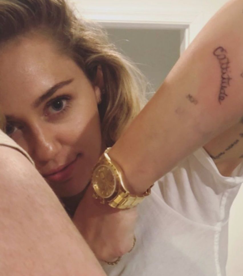 miley cyrus-cattitude tattoo