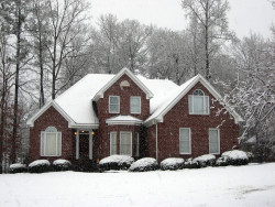 William Arsenault Contracting, LLC -Snow Covered Home