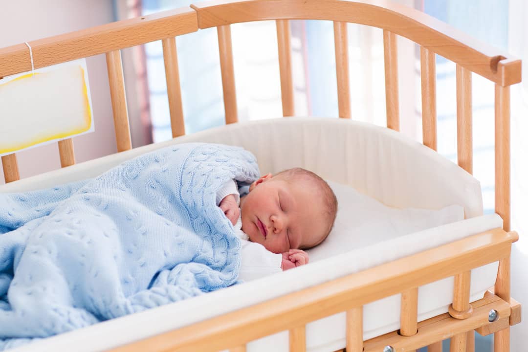 Baby is sleeping in the crib