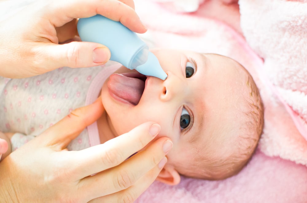Use Saline Nasal Spray Drops to Clean Baby's Nose