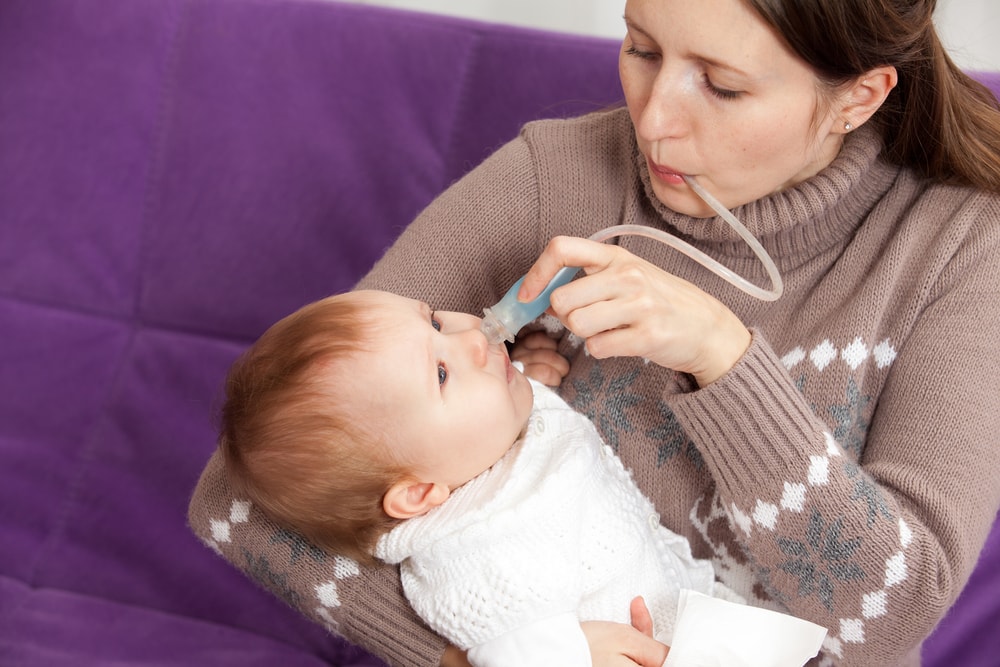 Using a nasal aspirator