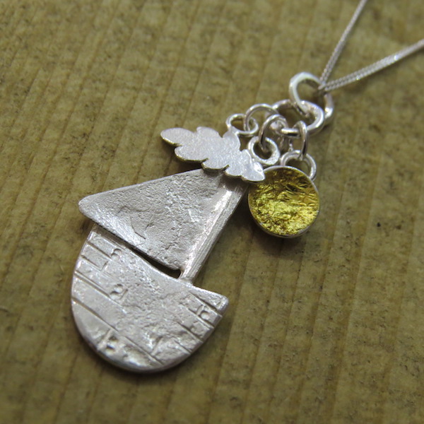 Sun, cloud and boat charm necklace